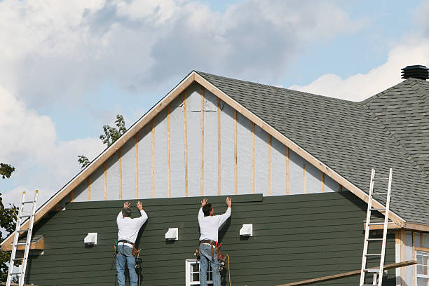 Professional Siding Installation technician working in Clinton, MD